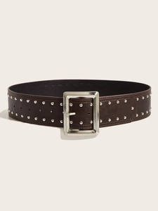 Detail view of dark brown leather belt featuring double rows of silver metal rivets