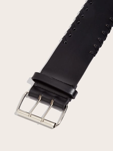 Detail of black leather belt featuring a silver double-pin buckle and braided stitching