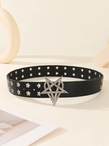 Close-up of a punk style black leather belt with a large rhinestone star buckle