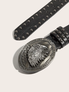 Macro detail of punk leather belt buckle featuring a silver eagle and star motif
