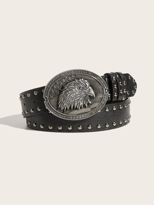 Detailed macro of punk black leather belt featuring eagle buckle and silver metal studs