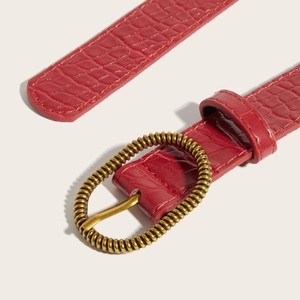 Vintage Y2K red faux leather belt with crocodile texture and brass oval buckle for women