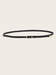 Detail of a thin black woven leather belt featuring a classic polished gold metal buckle