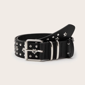 Close-up of black punk belt with silver metal studs and hollow stars on a leather band
