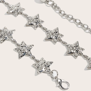 Star-shaped silver metal waist chain with rhinestone accents for dresses and skirts