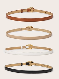 Présentation de quatre fines ceintures vintage en marron, beige, blanc et noir avec boucles d'or
