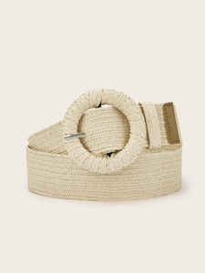 Detail view of woven bohemian belt with round buckle and straw texture finish