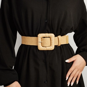 Bohemian straw woven belt with large square buckle on a black shirt dress for women