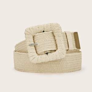 Detail of woven straw belt with rectangular fabric buckle and brown leather end decoration