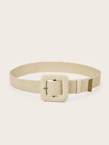 Detail of beige woven belt with a square buckle showing texture for summer dresses