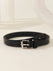 Detail of star-shaped cutouts and silver pin buckle on a black slim leather belt