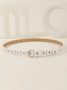 Detailed view of white slim leather belt featuring star-shaped cutouts and silver pin buckle