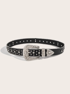 Close-up of black rhinestone belt with western-style buckle and silver stud details
