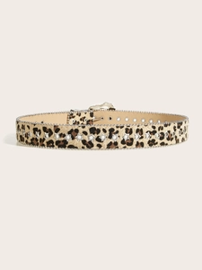Close-up of leopard print leather belt featuring silver stars and beaded metal trim