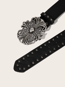 Macro shot of punk black leather belt featuring vintage silver buckle and metal rivets