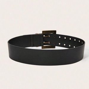 Detail of a punk style black leather belt with double row eyelets and brass double pin buckle