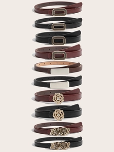 Pile verticale de diverses ceintures en cuir PU pour femmes avec boucles élégantes