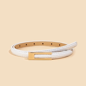 Elegant white crocodile embossed leather belt for women with a minimalist gold metal buckle
