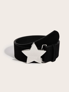 Detail of black suede belt featuring a large polished silver star buckle and fixed loop