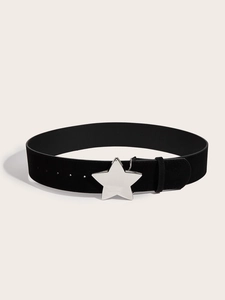 Detail of black suede belt featuring a polished silver star buckle and adjustable holes