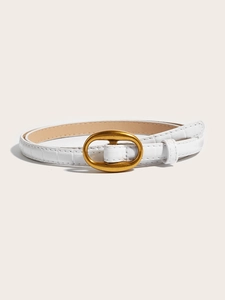 Detail of white faux crocodile leather belt with elegant oval gold buckle for women