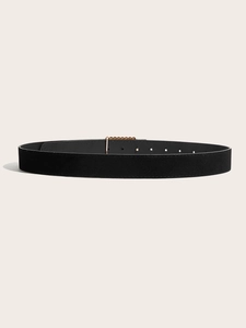 Close-up of black matte suede belt featuring gold hardware and precise adjustment holes
