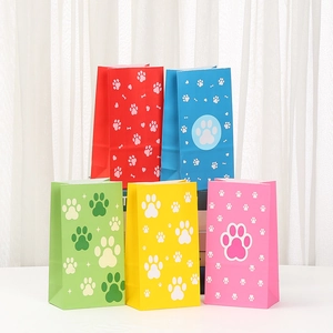 Set of colorful kraft paper gift bags with pet paw prints for parties and shopping