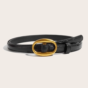 Women black leather skinny belt with crocodile pattern and golden oval metal buckle