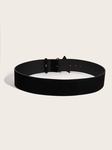 Detail of a wide black suede waist belt featuring a geometric gold metal buckle