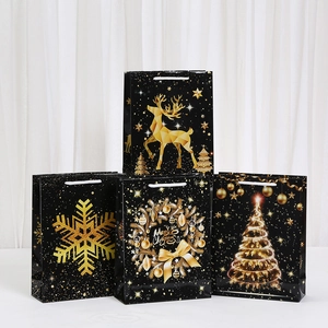 Black and gold Christmas paper gift bags with reindeer and snowflake patterns, set of 4