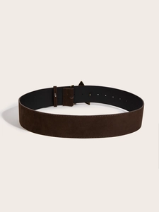 Close-up of vintage brown wide belt with suede texture and gold triangle buckle