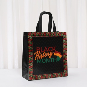 Detail of Black History Month non-woven tote bag with colorful African map print and patterns
