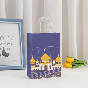 Detail view of purple Eid moon and castle printed paper gift bag with white rope handles