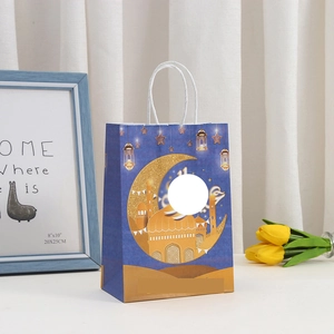 Detail of Ramadan gift bag featuring golden mosque prints and a round window design