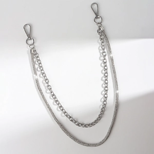 Detail of silver double-layered punk waist chain with rhinestones and lobster clasps