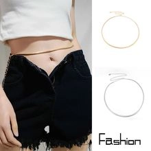 Detailed view of 4-layer gold and silver snake chain belts with adjustable lobster clasp