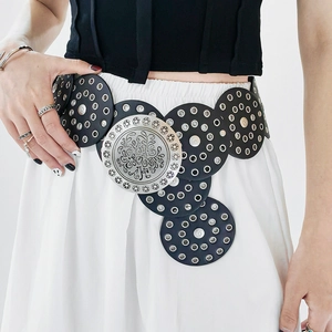 Detailed relief pattern on retro silver metal buckle of western style wide leather belt
