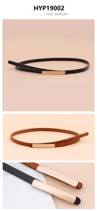 Détail de la boucle dorée en forme de 8 et texture cuir des fines ceintures pour femmes