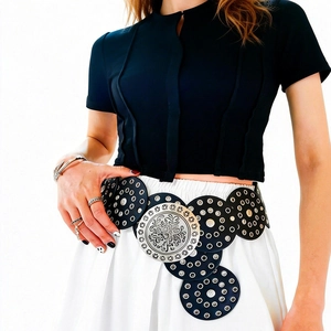 Vintage western wide belt with silver floral embossed metal discs and black leather links