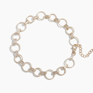 Detailed shot of vintage leopard style gold chain links with lobster clasp and extension chain