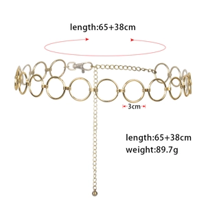 Detail of gold metal ring waist chain showing length 65+38cm and 3cm ring diameter