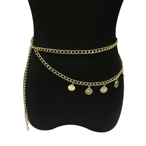 Detail of gold multi-layer waist chain featuring vintage portrait coin pendants and links