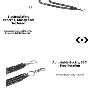 Detail of black plated double waist chain featuring 360-degree rotating swivel clasps