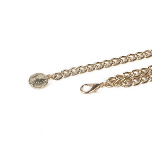 Vintage gold layered body chain with portrait coin pendant and lobster clasp for women