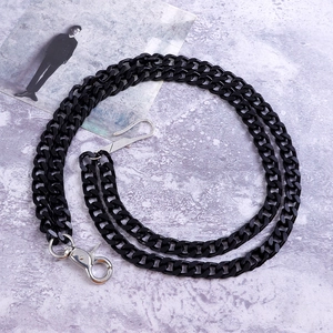 Close-up of double-layer black chunky metal pants chain with silver lobster clasps
