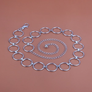 Detail view of silver metal waist chain with interlocking circles and lobster clasp
