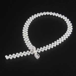 Elegant double-row pearl waist belt with a sparkling rhinestone bow buckle for women