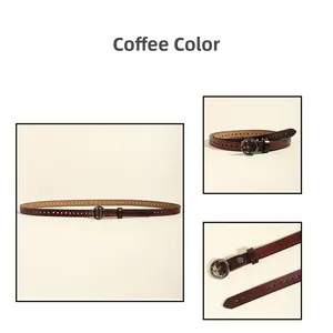Detail von kaffeebraunem Ledergürtel mit runder Silberschnalle und Lochmuster