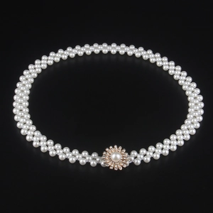 Elegant white double-row pearl belt featuring a sparkling rhinestone flower buckle clasp