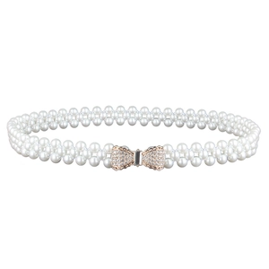 Elegant white double-row pearl belt with a sparkling rhinestone-encrusted bow buckle